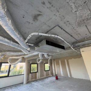 Ductable air conditioner installed with flexible air ducts in a commercial building in Kenya